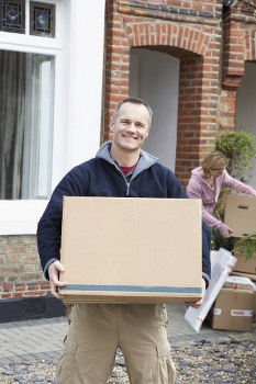 Professional removal team loading items for a move in Lambeth