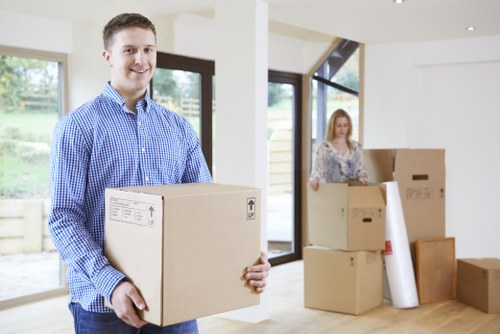 Moving company equipment and boxes arranged for relocation