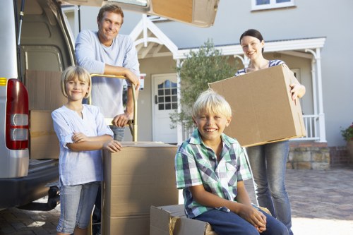 Packed moving boxes and furniture ready for removals in Lambeth