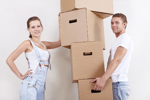 Unpacking boxes in a new home after moving in Lambeth